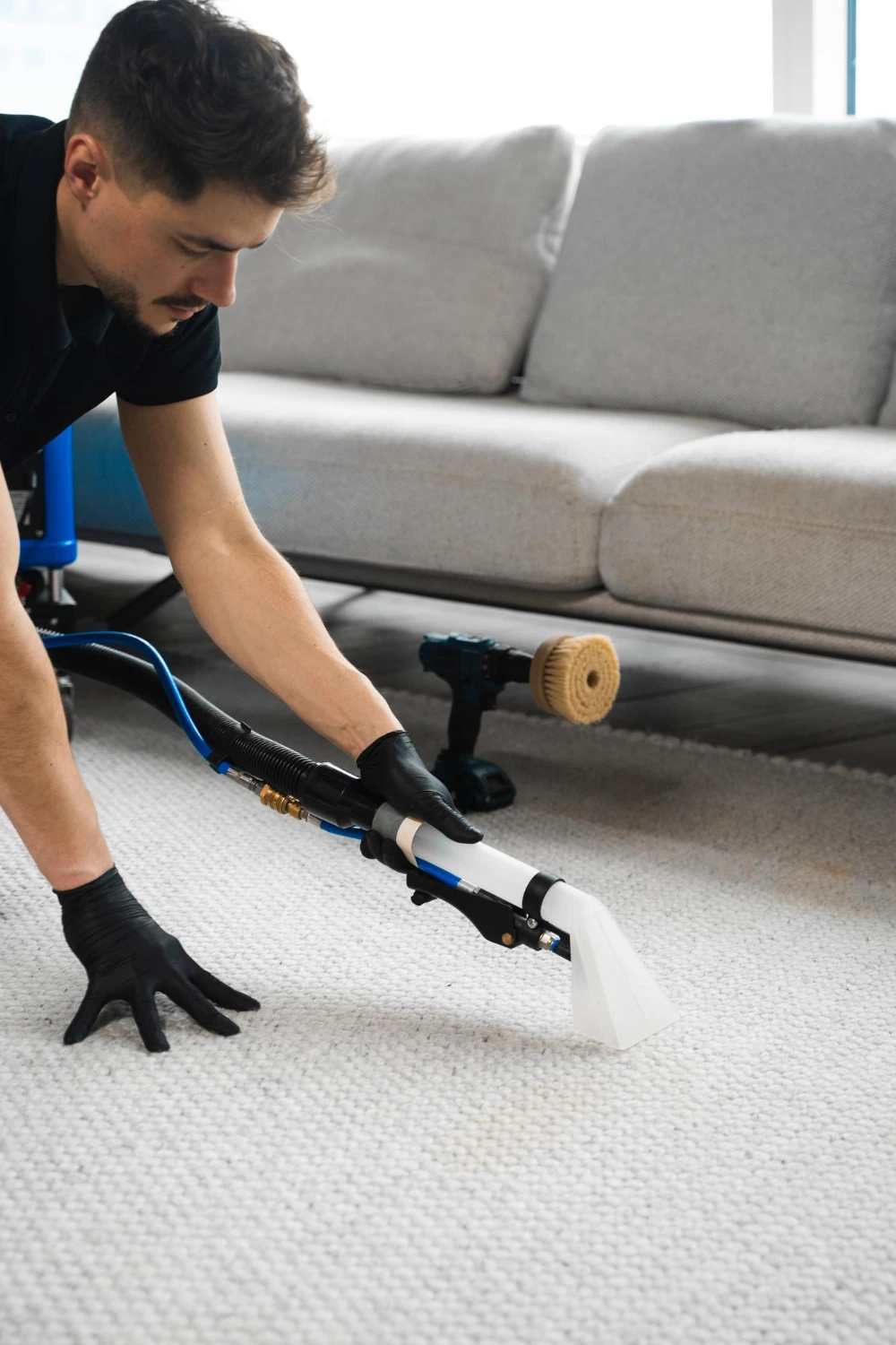 Elite Steam Carpet Cleaning technician steam cleaning a carpet